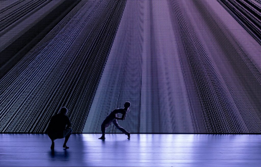 "Living Archive: An AI Performance Experiment" by Wayne McGregor - Rebecca Bassett-Graham and Izzac Carroll - Photo by Cheryl Mann