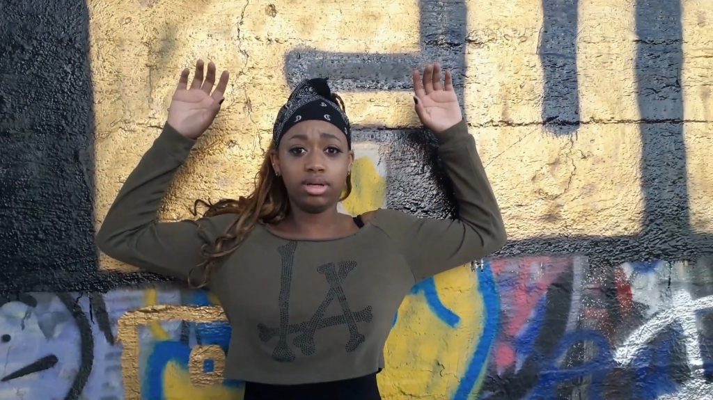 Smash Cut, dances for camera - Harmonie Outlaw in Stacey Strickland Jr's "Plea For My People" - Screenshot by LADC