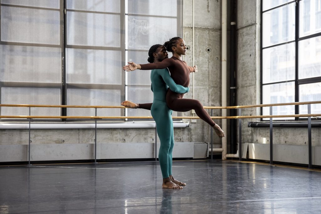 "Landrover" by Merce Cunningham - Dancers Jacquelin Harris (brown costume) and Chalvar Monteiro (teal costume) - Photo by Maria Baranova