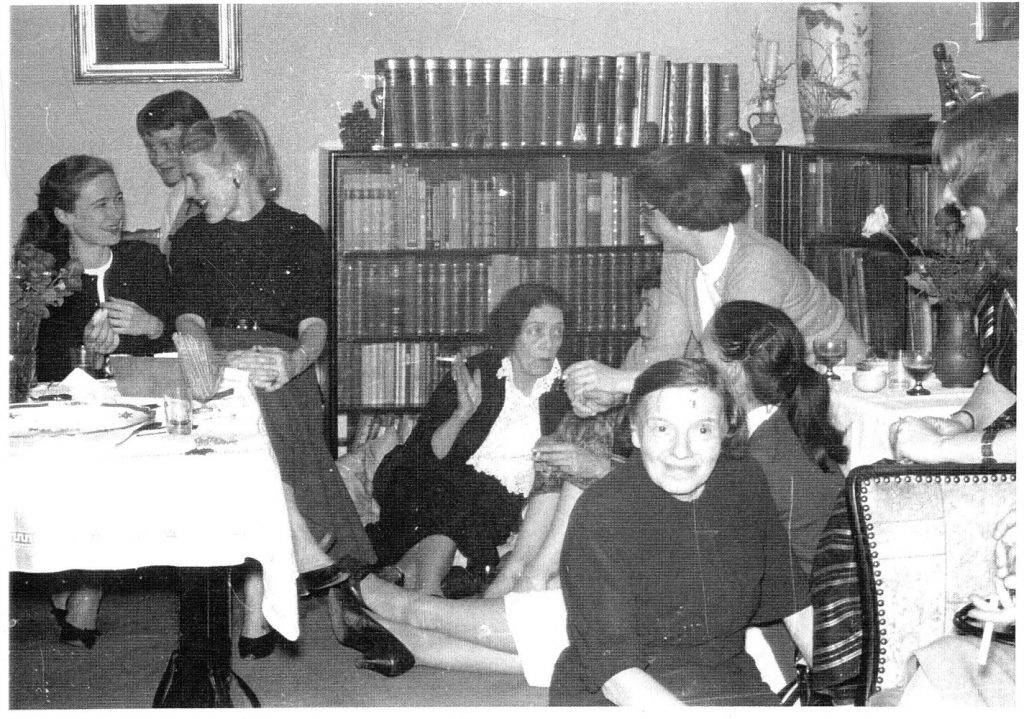 Christmas Party at Mary Wigman’s Emma Lewis Thomas is sitting at the back of the table on the left of the photograph behind Betty Toman and Joan Woodbury. Mary Wigman is seated on the floor holding a cigarette. Wigman’s companion Heschen is looking directly at the camera.