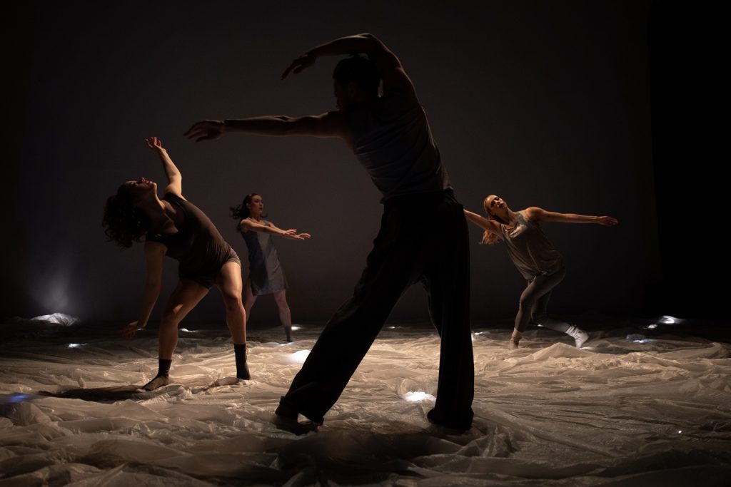Still Moving - BrockusRED dancers "Great Beyond" choreography by Deborah Brockus - Photo by Denise Leitner